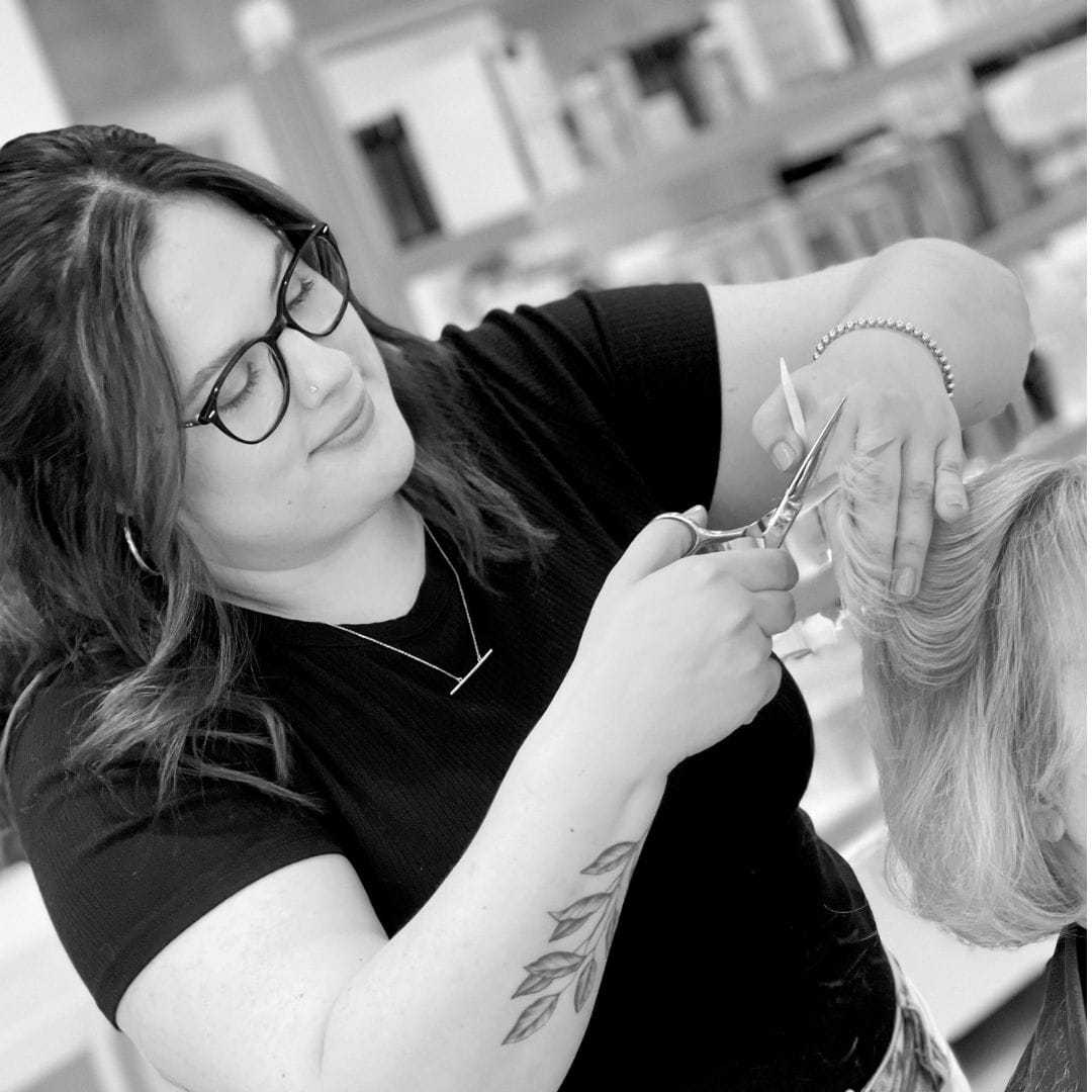 Portrait of Catherine, a professional stylist at Hue Salon Houston, showcasing their expertise and style.